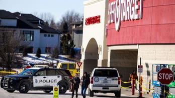 Armed Nebraska man shot by police at Target hadn't yet shot at anyone, report says