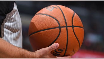 Virginia high school basketball coach jumps into stands, gets physical with heckler in wild scene