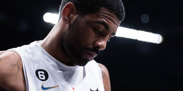 Kyrie Irving of the Brooklyn Nets before the start of the fourth quarter of a game against the New York Knicks at Barclays Center on January 28, 2023 in New York City. 