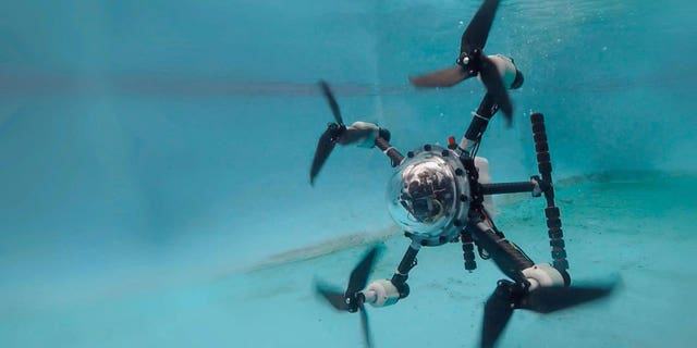 A black drone capable of maneuvering underwater. The TJ-Flying Fish was developed in China.