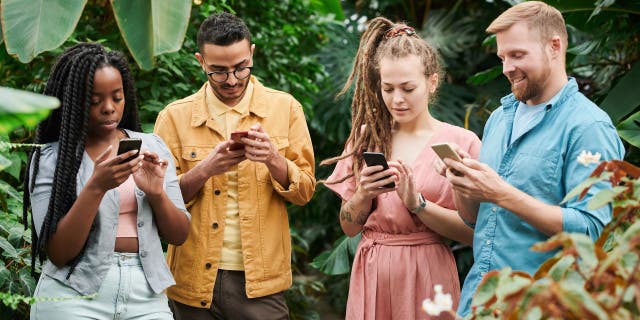 Friends holding phones