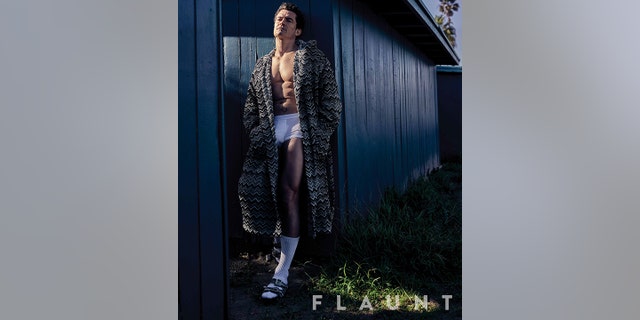 Orlando Bloom poses in his boxers and a large MISSONI jacket for Flaunt Magazine.
