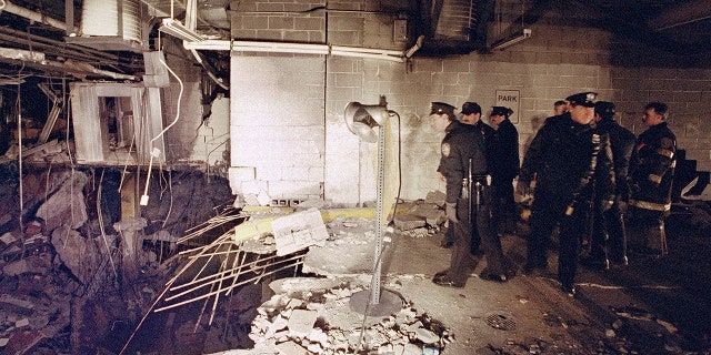 New York City constabulary and firefighters inspected nan explosive crater wrong an underground parking car shed of New York's World Trade Center connected Feb. 27, 1993, nan time aft an detonation tore done it.
