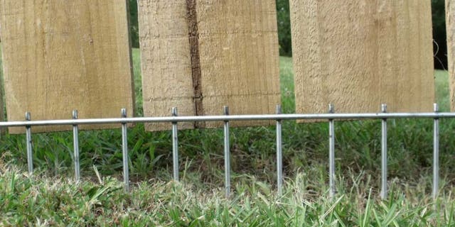 The Dig Defense Fence Extender helps keep pets in the yard and predators out.