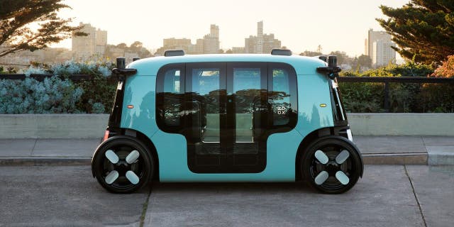 A Zoox car on the street.