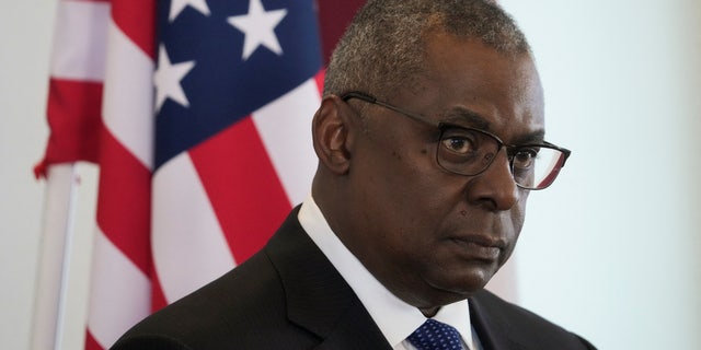 U.S. Defense Secretary Lloyd Austin attends a news conference with Latvian Defense Minister Artis Pabriks in Riga, Latvia August 10, 2022. 