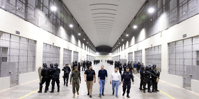 Salvadoran President Nayib Bukele takes part in a tour of the Tecaluca Terrorist Detention Center on February 1, 2023.