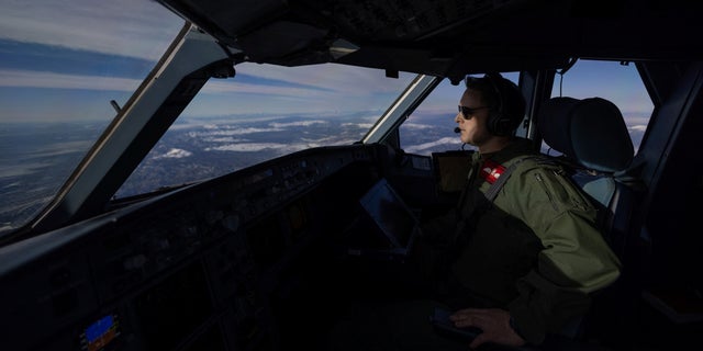 A crew member of a Voyager KC-30 aircraft is pictured inside the plane cabin during the annual Red Flag military exercise between the United States, Britain and Australia, in Nevada Feb. 8, 2023.