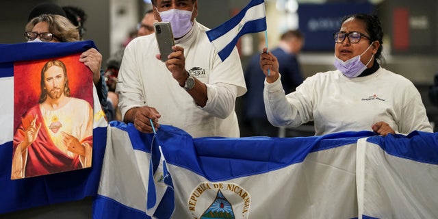 Activists await the arrival of some of the more than 200 political prisoners from Nicaragua at Dulles International Airport in Virginia outside Washington, U.S., after being released and flown to the United States February 9, 2023. 