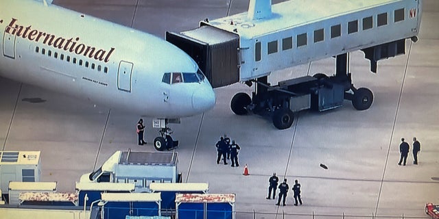 An aircraft, carrying some of the more than 200 political prisoners released from Nicaragua and flown to the United States, sits at a gate at Dulles International Airport in Virginia outside Washington, D.C.