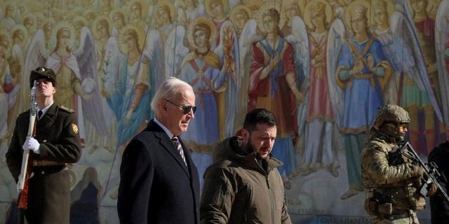 President Joe Biden and President Volodymyr Zelenskiy walk next to St. Michael's Cathedral in Kiev, Ukraine on February 20, 2023.
