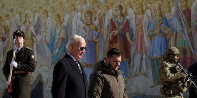 U.S. President Joe Biden and Ukraine's President Volodymyr Zelenskyy walk next to Saint Michael’s cathedral, amid Russia's attack on Ukraine, in Kyiv, Ukraine February 20, 2023.