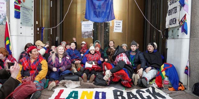 Campaigners from Nature and Youth and the Norwegian Samirs Riksforbund Nuorat block the entrances to the Ministry of Oil and Energy with Greta Thunberg in Oslo, Norway, Feb. 27, 2023. 