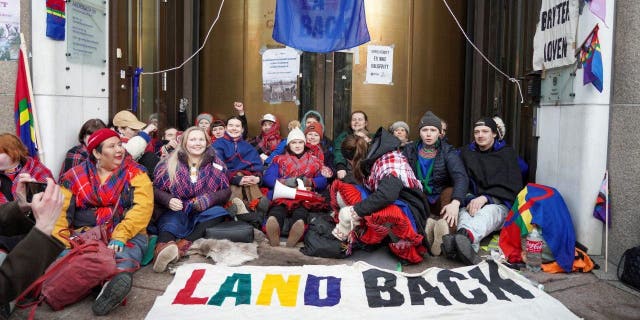 Campaigners from Nature and Youth and the Norwegian Samirs Riksforbund Nuorat block the entrances to the Ministry of Oil and Energy with Greta Thunberg in Oslo, Norway, Feb. 27, 2023. 