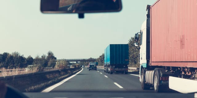Tractor trailers on the road.