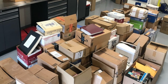 Detectives found "countless printed photographs of pornography, many of which depicted CSAM" that "had been arranged into large stacks and boxes throughout Zittel’s bedroom and office, and a printer on his desk displayed obvious signs of heavy use."
