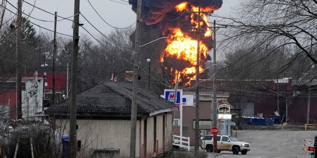 A black plume and fireball rise over East Palestine, Ohio, as a result of a controlled detonation of a portion of the derailed Norfolk and Southern trains Monday, Feb. 6, 2023. 