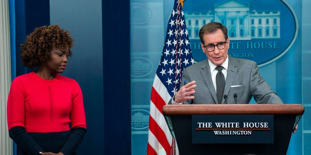 White House press secretary Karine Jean-Pierre and National Security Council spokesman John Kirby listen during a press briefing at the White House, Monday, Feb. 27, 2023, in Washington.
