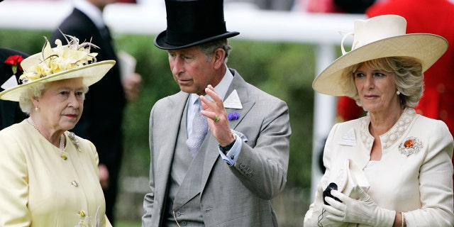 The former Prince Charles, center, thanked his mother Queen Elizabeth II, left, for her support.