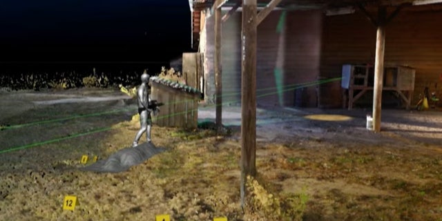 Maggie Murdaugh crime scene recreation showing a 5-foot-2 shooter's possible stance and gun angle to hit the quail pen. A projectile struck the pen during the June 7, 2021, slaying. Maggie's body is shown in the foreground covered in a gray sheet, as yellow markers identify the location of shell casings.