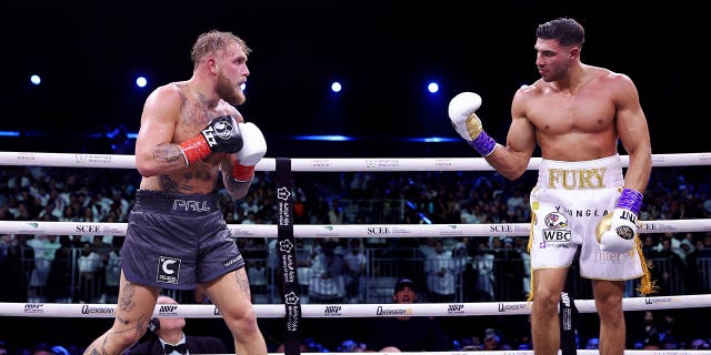 Jake Paul looks on as Tommy Fury taunts him during the fight at Diriyah Arena on February 26, 2023, in Riyadh, Saudi Arabia.