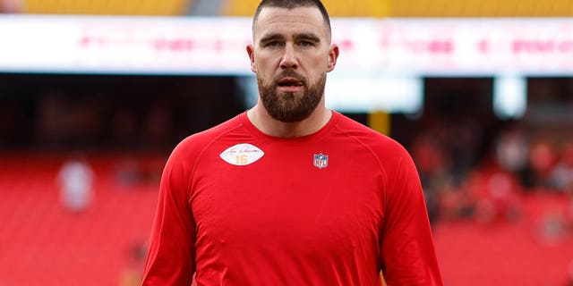 Travis Kelce, #87 of the Kansas City Chiefs looks on prior to the AFC Championship NFL football game between the Kansas City Chiefs and the Cincinnati Bengals at GEHA Field at Arrowhead Stadium January 29, 2023 in Kansas City, Missouri.