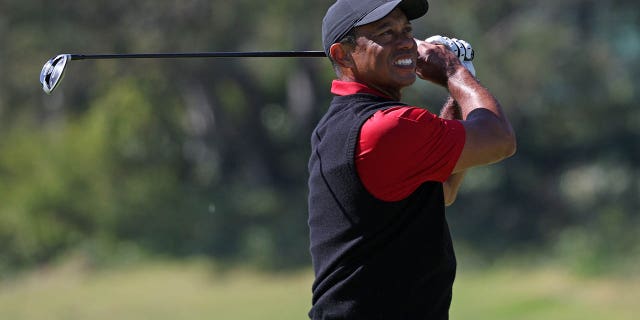 Tiger Woods of the United States plays his second shot from the 17th hole during the final round of the Genesis Invitational at Riviera Country Club on February 19, 2023, in Pacific Palisades, California.