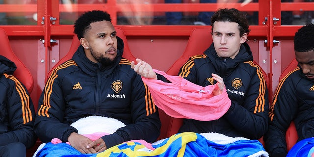 Weston McKennie of Leeds United, left, sits next to Brenden Aaronson of Leeds United on the substitutes' bench during the Premier League match between Nottingham Forest and Leeds United on Feb. 5, 2023 in Nottingham.