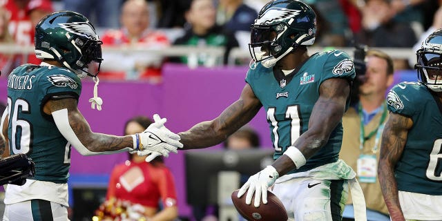 AJ Brown #11 of the Philadelphia Eagles celebrates with Miles Sanders #26 of the Philadelphia Eagles after catching a 45-yard touchdown pass during the second quarter against the Kansas City Chiefs in Super Bowl LVII at State Farm Stadium on January 12 February 2023, in Glendale, Arizona.