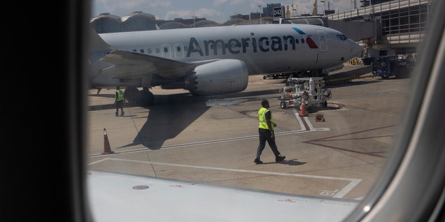 An American Airlines flight prepares to take off on August 30, 2022 at LaGuardia Airport in Queens, NY. 