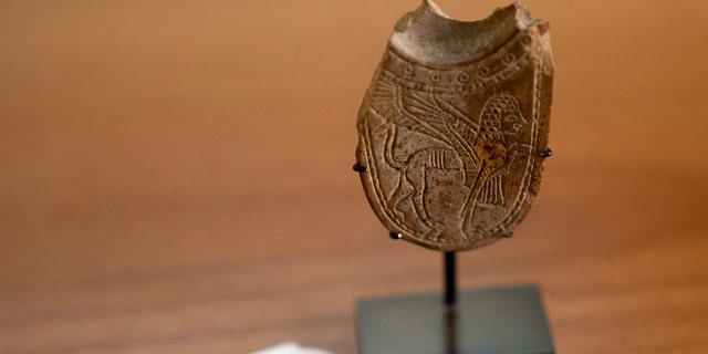 A 2,700-year-old ivory incense spoon on display at the Palestinian Ministry of Tourism and Antiquities in the West Bank city of Bethlehem on Thursday, Jan. 19, 2023. 