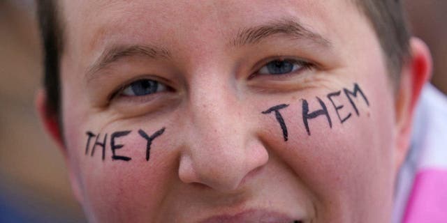 Zee Kilpack is photographed at a rally where hundreds gathered in support of transgender youth at the Utah State Capitol, Tuesday, Jan. 24, 2023, in Salt Lake City.