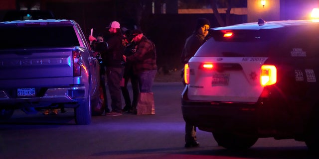 Las Vegas police work near the home of former actor Nathan Lee Chasing His Horse, who goes by Nathan Chasing Horse, Tuesday, Jan. 31, 2023, in North Las Vegas, Nev.