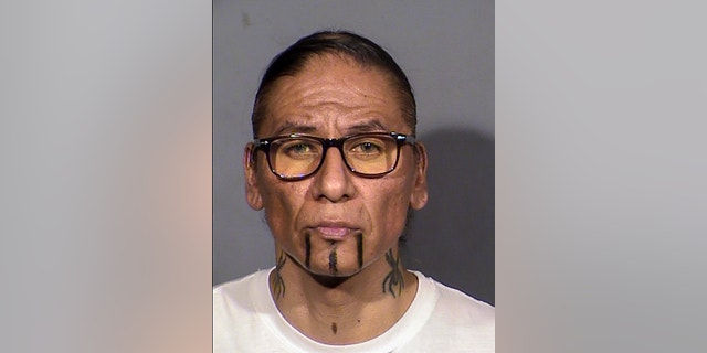 This booking photo released by the Las Vegas Metropolitan Police Department shows former actor Nathan Chasing Horse, who could face multiple sexual assault and sex trafficking charges and life in prison.