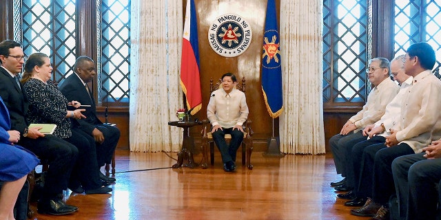 Philippine President Ferdinand Marcos Jr., center, talks with U.S. Secretary of Defense Lloyd James Austin III, third from left, during a courtesy call at the Malacanang Palace in Manila, Philippines on Thursday, Feb. 2, 2023. 