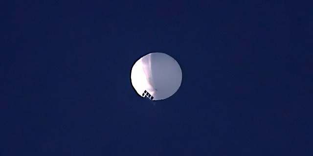 A high altitude balloon floats over Billings, Mont., on Wednesday, Feb. 1, 2023.