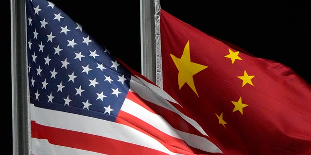 The American and Chinese flags. 