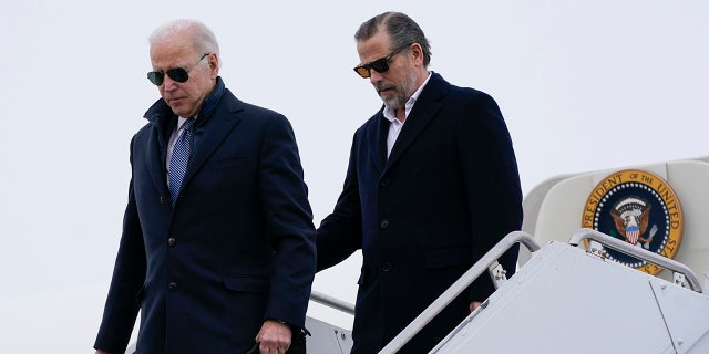 President Joe Biden and his son, Hunter Biden, step off Air Force One, Saturday, Feb. 4, 2023, at Hancock Field Air National Guard Base in Syracuse, N.Y. 