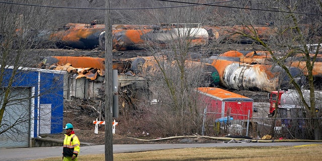 The derailed Norfolk Southern freight train is pictured on Feb. 9 as the cleanup continues. 