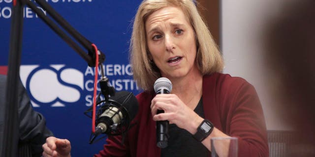 FILE - Dane County Circuit Court Judge Jill Karofsky speaks during a Wisconsin Supreme Court candidate's forum in the offices of Foley &amp;amp; Lardner LLP in Madison, Wisconsin, on Nov. 19, 2019.