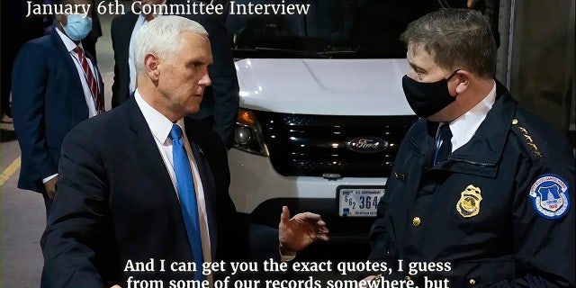 Former Vice President Mike Pence, seen talking from his secure loading dock location during the Jan. 6 riot, is facing a DOJ subpoena related to investigations into former President Trump's efforts to overturn the 2020 election results.