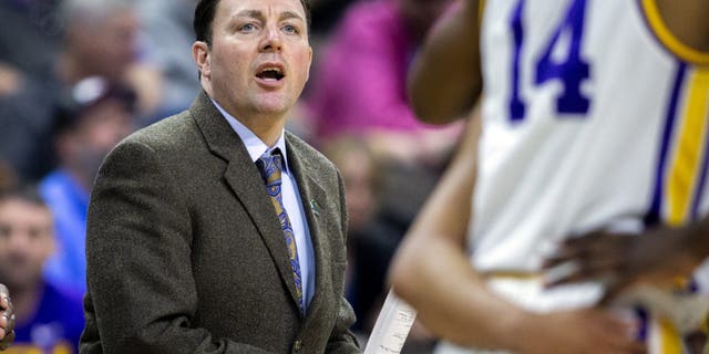 Then-LSU assistant coach Greg Heiar, center, shouts from the sideline during the team's NCAA men's college basketball tournament game against Yale in Jacksonville, Florida, March 21, 2019.