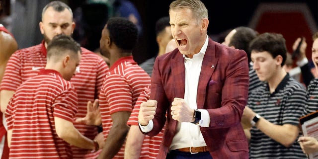 Alabama head coach Nate Oats reacts to a basket against Auburn, Saturday, Feb. 11, 2023.