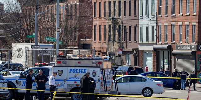 NYPD gather at the scene where a rental truck was stopped and the driver arrested on Feb. 13, 2023, in the Bay Ridge neighborhood of Brooklyn. 