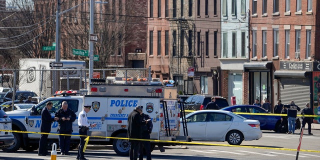 NYPD gather at the scene where a rental truck was stopped and the driver arrested on Feb. 13, 2023, in the Bay Ridge neighborhood of Brooklyn.