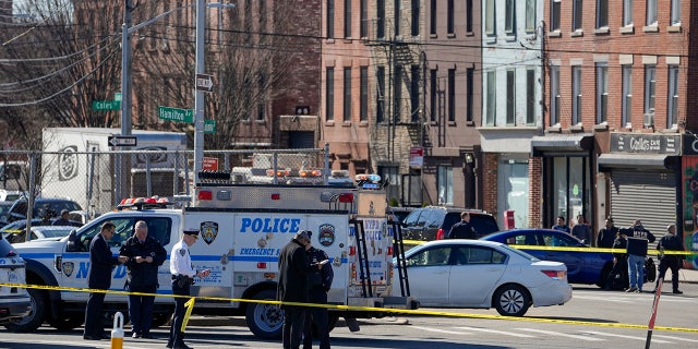 NYPD gather at the scene where a rental truck was stopped and the driver arrested on Feb. 13, 2023, in the Bay Ridge neighborhood of Brooklyn. 