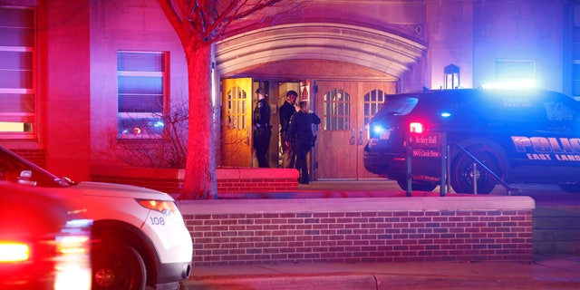 Police investigate the scene of a shooting at Berkey Hall on the campus of Michigan State University, late Monday, Feb. 13, 2023, in East Lansing, Mich. (AP Photo/Al Goldis)