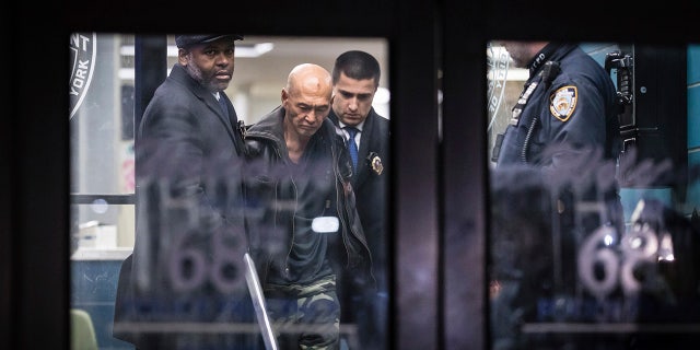 Weng Sor was escorted from a Brooklyn precinct Feb. 14, 2023, a day after allegedly killing one and injuring eight others in a rented U-Haul truck.