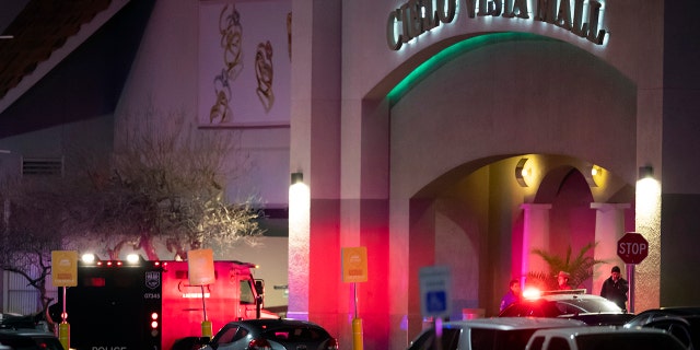 Law enforcement agents are seen at an entrance of the Cielo Vista Mall, on Wednesday, Feb. 15, 2023, in El Paso, Texas.