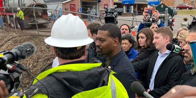 EPA administrator Michael Regan seen answering questions at Sulfur Creek in East Palestine, Ohio on Thursday, Feb. 16, 2023. He was back in East Palestine Tuesday.